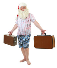 Santa Claus holding suitcases, isolated on white