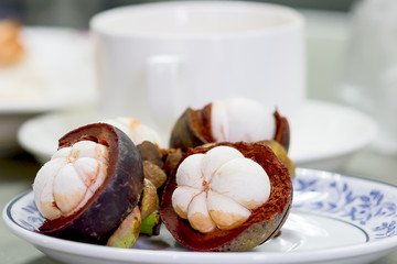 purple mangosteen in plate
