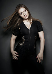 
Young beautiful sexy girl in lingerie lying on a white