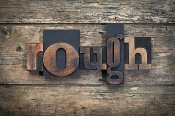 rough, word written with vintage letterpress printing block