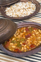 Turkish traditional meal, beans, rice, mixed pickles and tzatziki