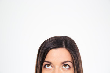 Cropped image of a woman looking up
