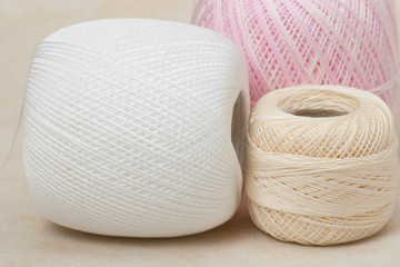 Threads Set On A Textile Background