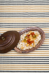 Turkish traditional meal, beans, rice, mixed pickles and tzatziki