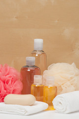 Fototapeta na wymiar Shampoo, Liquid Soap, Aromatic Bath Salt And Other Toiletry