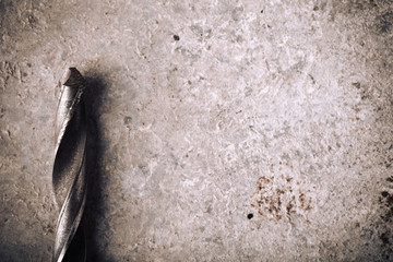 Drill on the grunge concrete