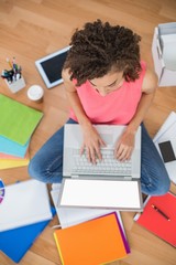 Fototapeta na wymiar Young creative businesswoman working on laptop