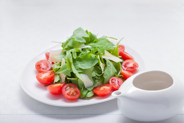Salad with arugula, tomatoes