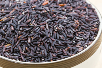 Rice berry in a bowl .