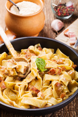 Pasta Carbonara with bacon, basil and cheese