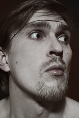 Fototapeta premium Strange portrait of a young man