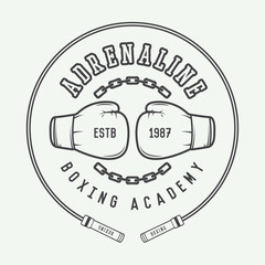 Boxing and martial arts logo, badge or label in vintage style. Vector illustration