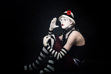 funny mime on black background