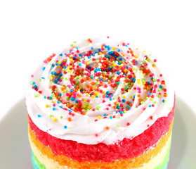 Colorful rainbow cakes on white.