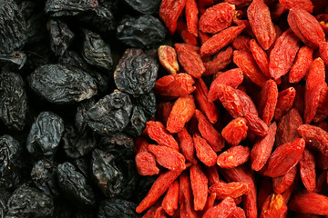 Goji berries and raisins close up