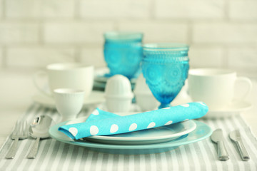 Beautiful holiday table setting in white and blue color