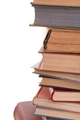 Heap of books on light background