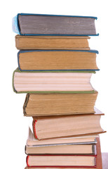 Heap of books on light background