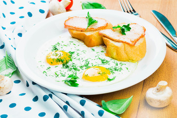 Breakfast. Fried eggs and sandwiches