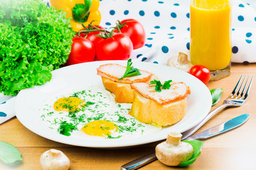 Breakfast. Fried eggs and sandwiches