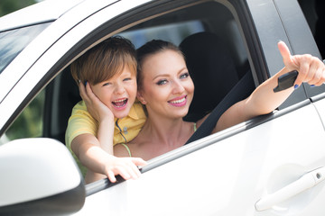 Mother with son in the car