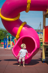 Fototapeta na wymiar Child playing in park
