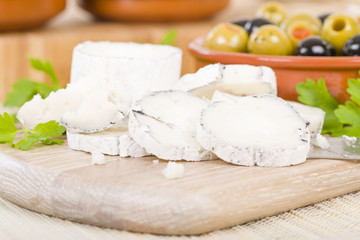 Goat's Cheese & Olives - Full fat mould ripened soft goat's milk cheese served with mixed olives.
