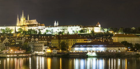 Fototapeta na wymiar Illuminated Prague Castle in summer by night, Czech Republic, Europe
