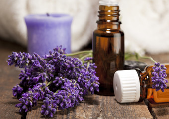 Obraz na płótnie Canvas Lavender Blossoms and Aromatherapy Oil