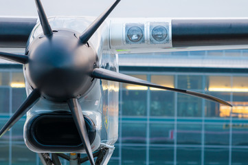 Propeller plane parking at the airport