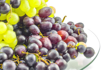 Bunch of grapes on glass table