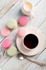Cup of coffee and macaroons