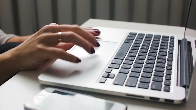 Work with  laptop scroll and  typeing on keyboard