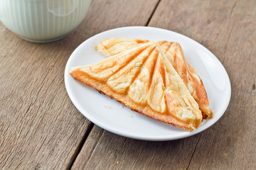 Tuna puff. Tuna sandwich on wood table.