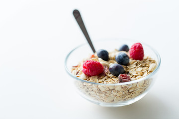 close up of bowl with granola or muesli on table