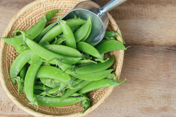 Fresh green soybeans on a wooden vintage