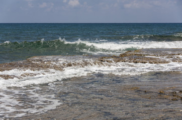 Sea wave hit the rock