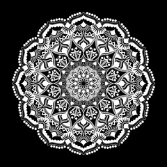 Mandala white ornament isolated on black background.