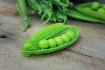 Fresh green soybeans on a wooden vintage
