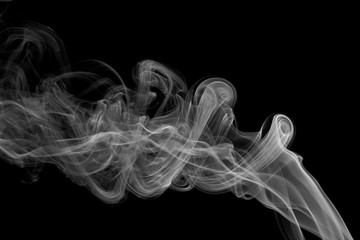 Movement of white smoke on black background