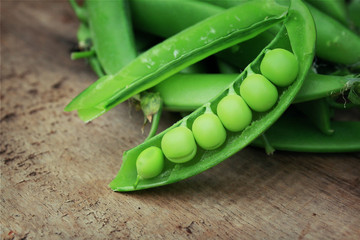 Fresh green soybeans on a wooden vintage