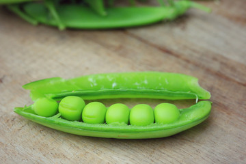 Fresh green soybeans on a wooden vintage