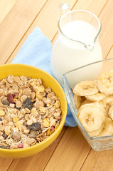Delicious and healthy cereal in bowl with milk