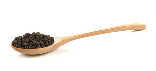 black pepper in wooden spoon isolated on white