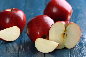 Naklejka na ściany i meble Ripe red apples on table close up