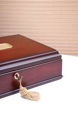 Beautiful wooden box with a metal key