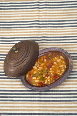 Turkish traditional meal, beans, rice, mixed pickles and tzatziki