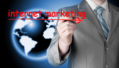 business man writing internet marketing