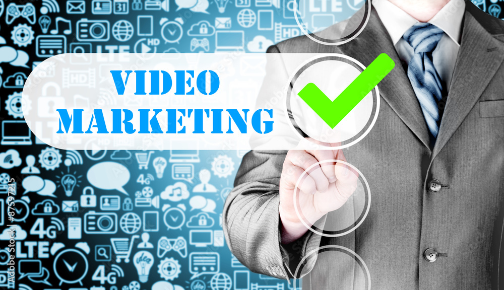 Wall mural business man pressing checkbox Video Marketing