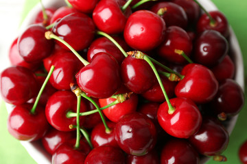 Sweet cherries in bowl close up
